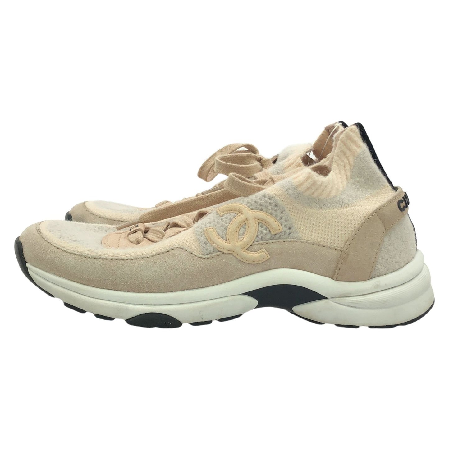 CHANEL Pink Sneakers - Timeless Elegance and Craftsmanship