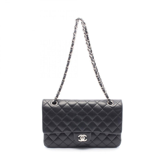 CHANEL Matelassé Double Flap Shoulder Bag in Black Lambskin