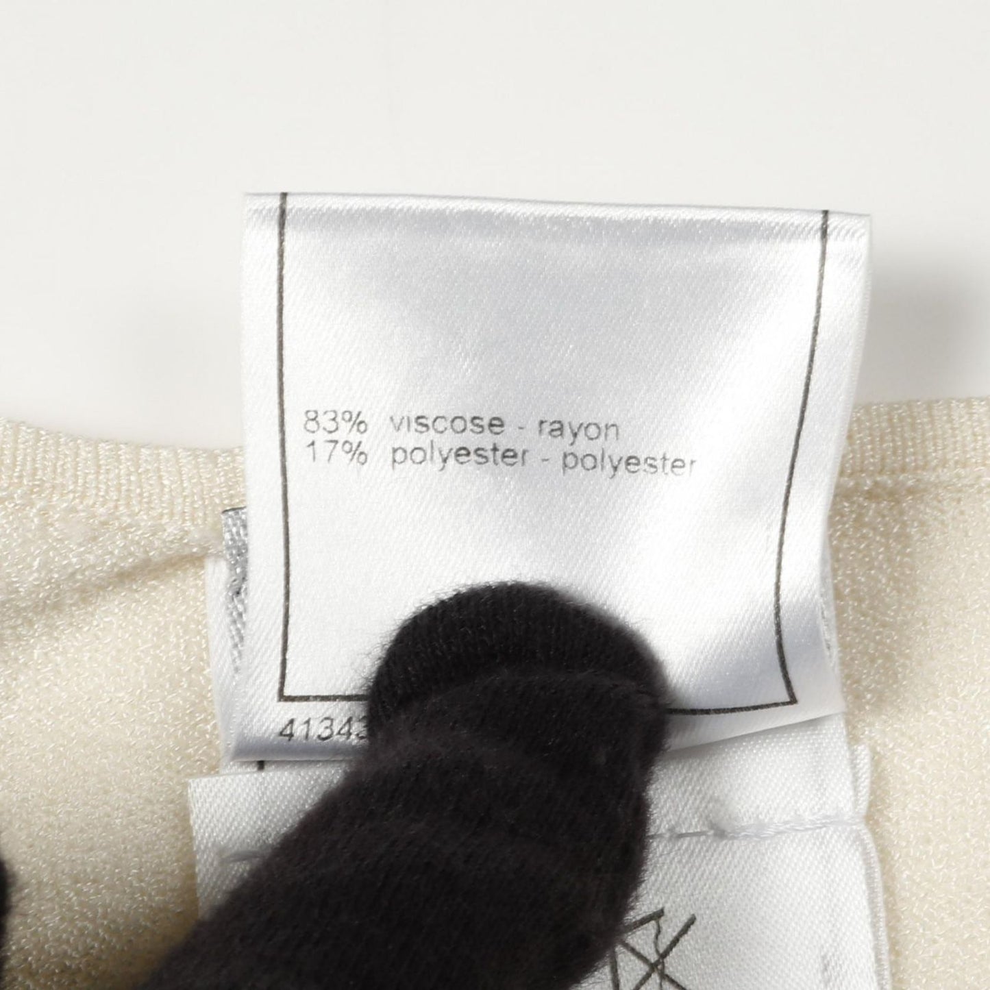 CHANEL Coco Mark Knit Top - Exquisite White Rayon Elegance