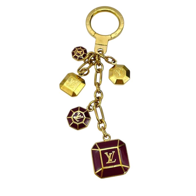 Louis Vuitton Port Clé Cabochon Gold Accessory - Timeless Elegance
