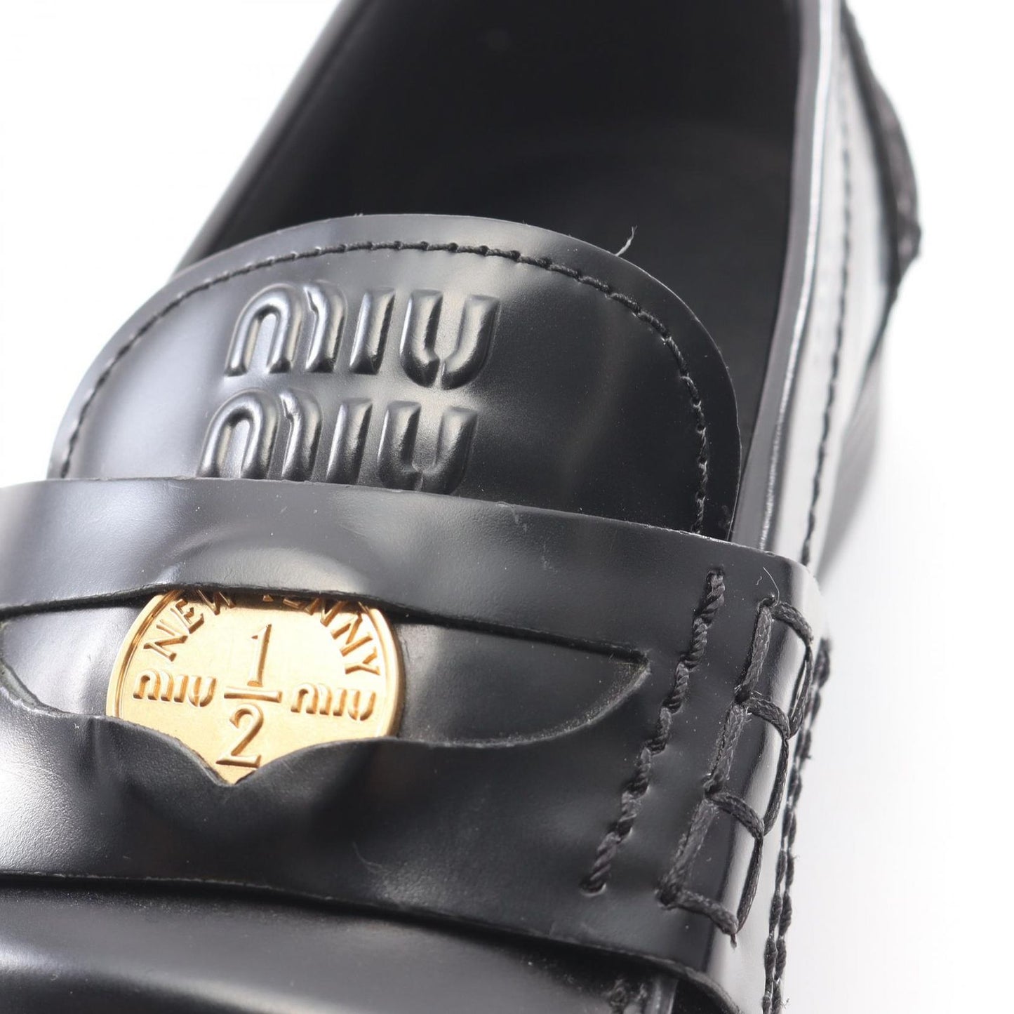 Miu Miu Penny Loafers in Black Leather - Timeless Elegance