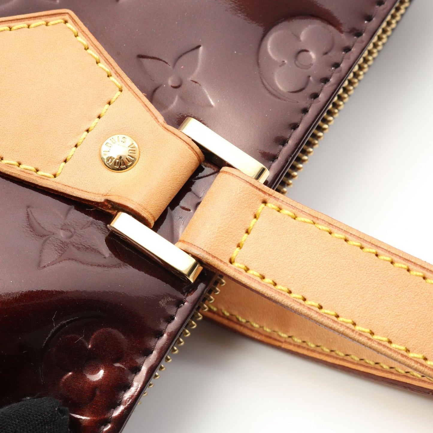 Louis Vuitton Houston Handbag in Amarante Vernis Leather