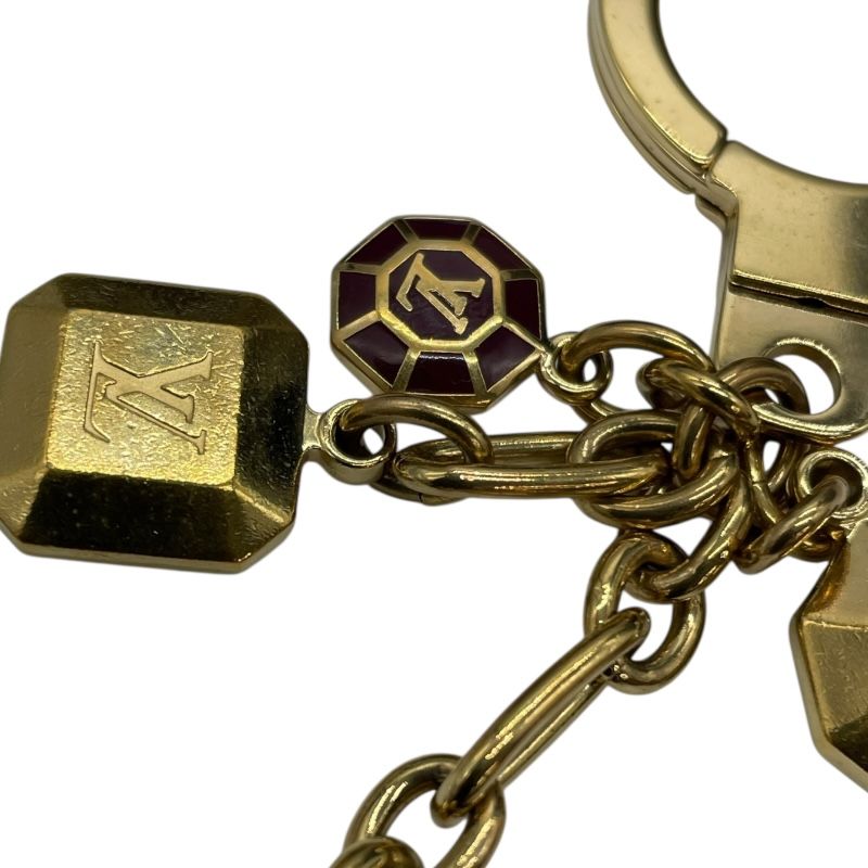 Louis Vuitton Port Clé Cabochon Gold Accessory - Timeless Elegance