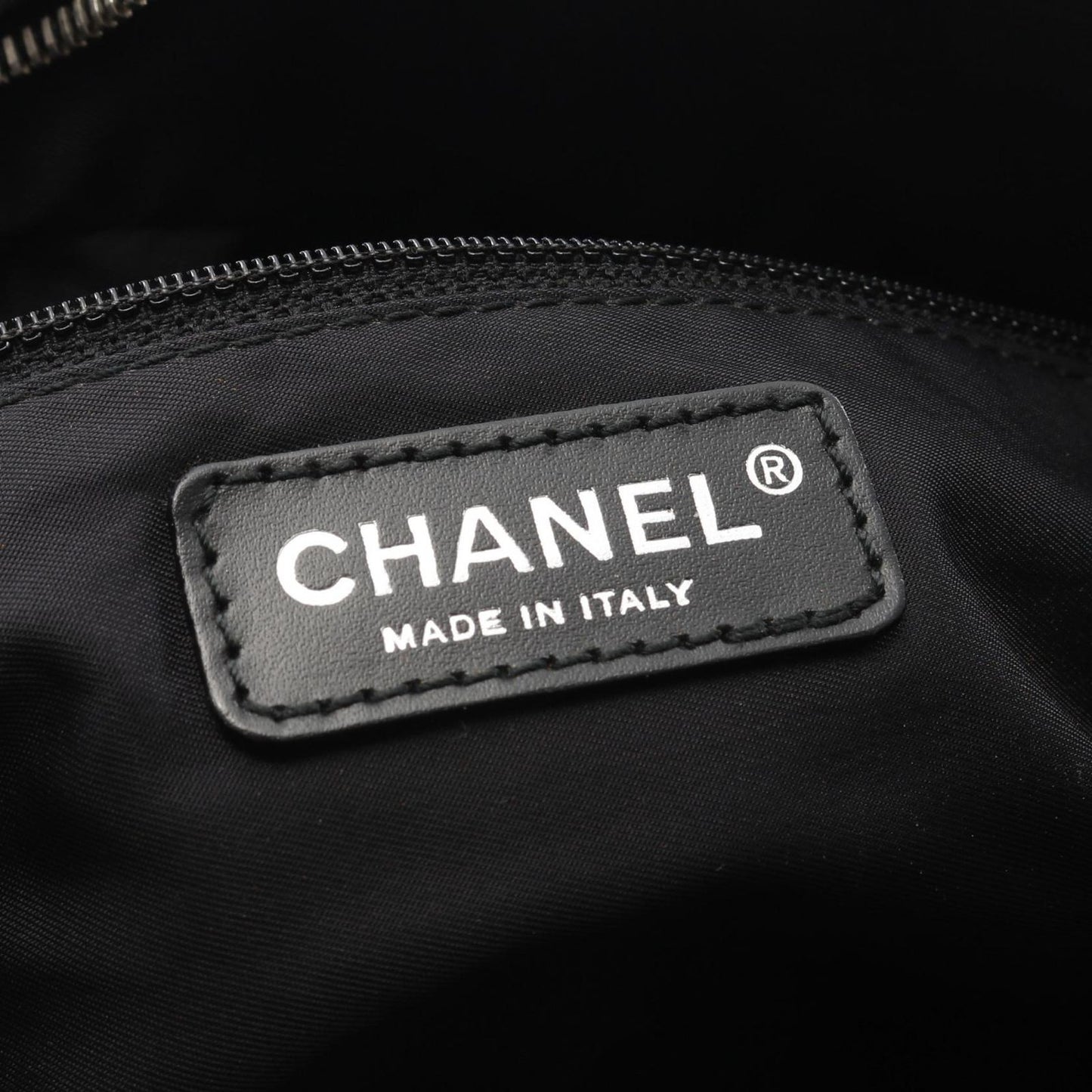 CHANEL Black Leather New Travel Line Handbag - Timeless Elegance