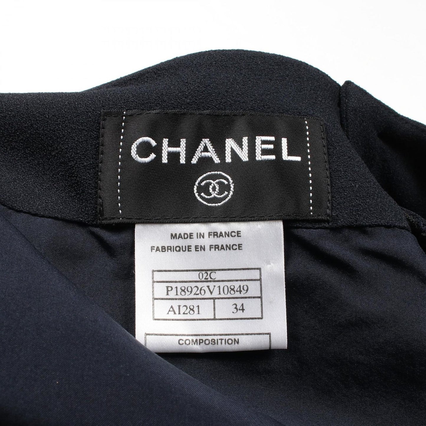 CHANEL Camellia Button Skirt in Navy - Exquisite Craftsmanship