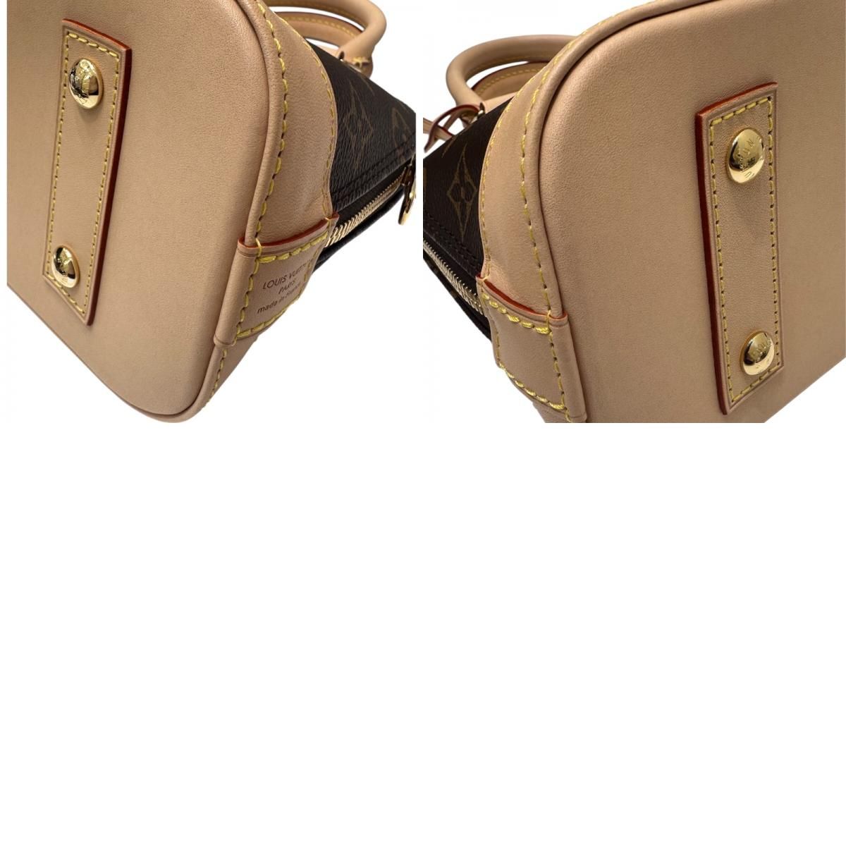 Louis Vuitton Alma BB Monogram PVC Leather Handbag - Timeless Elegance