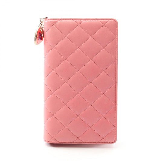 CHANEL Matelassé Pink Lambskin Wallet - Exquisite Luxury