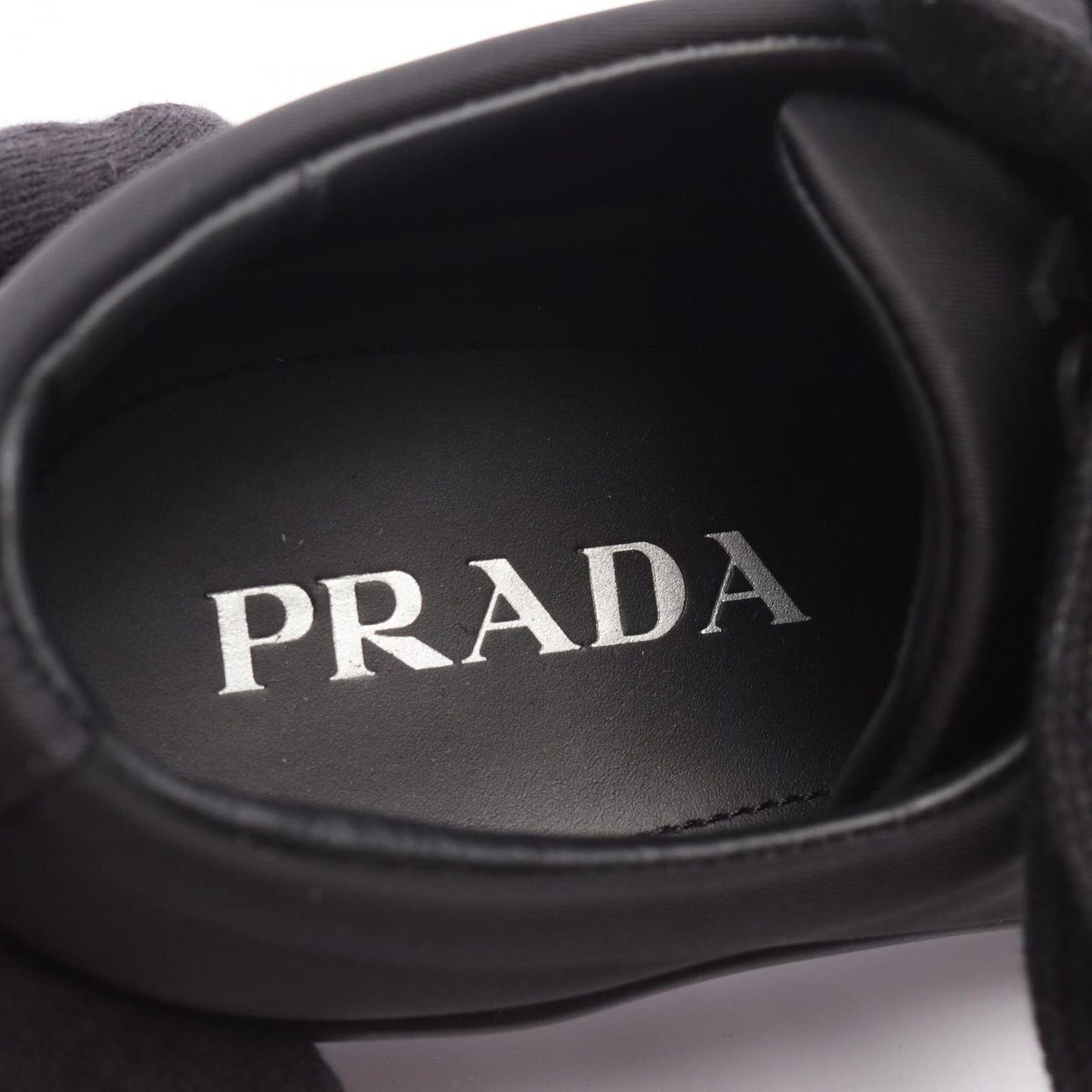 PRADA RE-NYLON Wheel Cassette Sneakers - Timeless Black Elegance