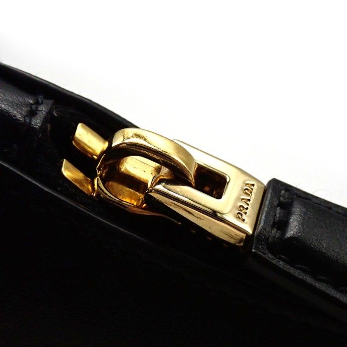 PRADA Arke Small Calf Leather Handbag - Black with Gold Accents