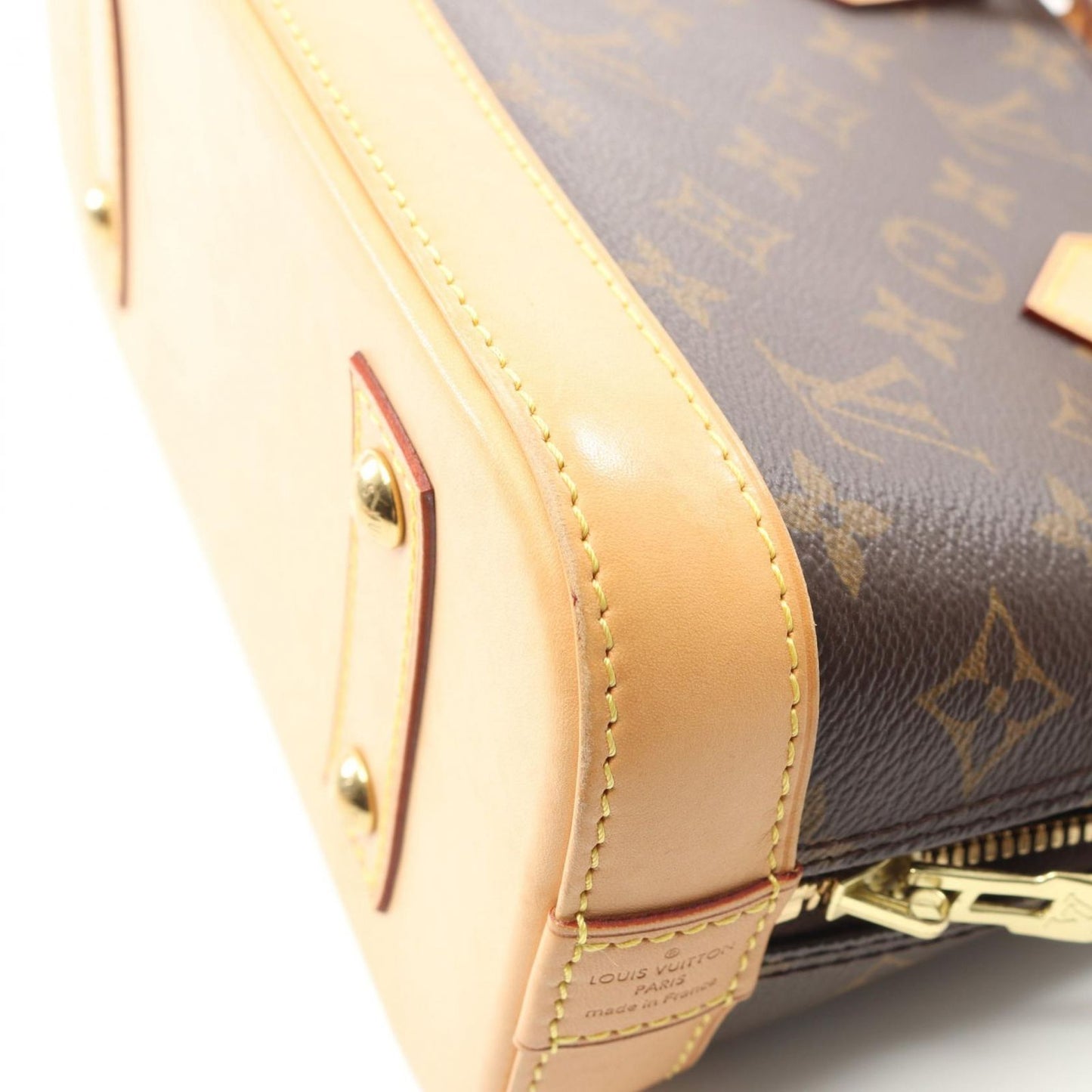 Louis Vuitton Alma BB Monogram Handbag - Timeless Elegance