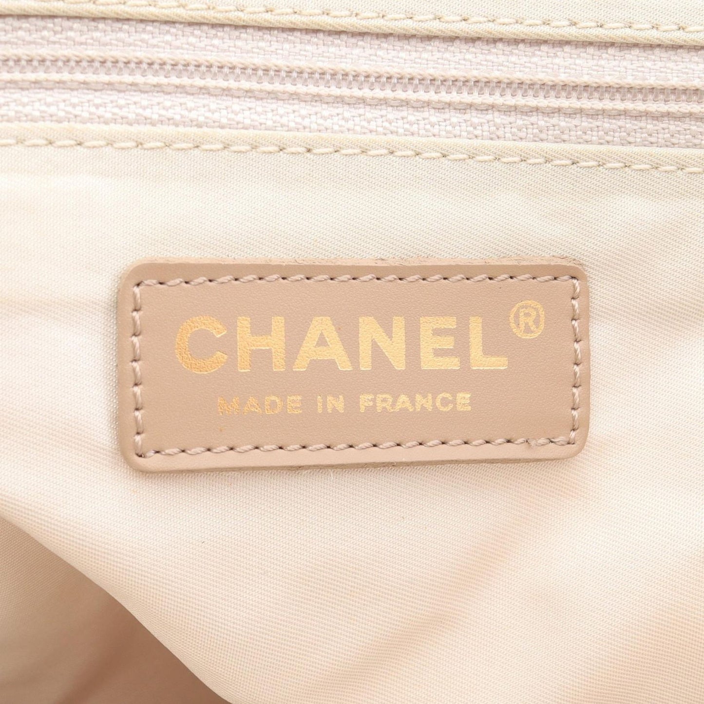 CHANEL Beige Leather New Travel Line MM Tote Bag - Timeless Elegance