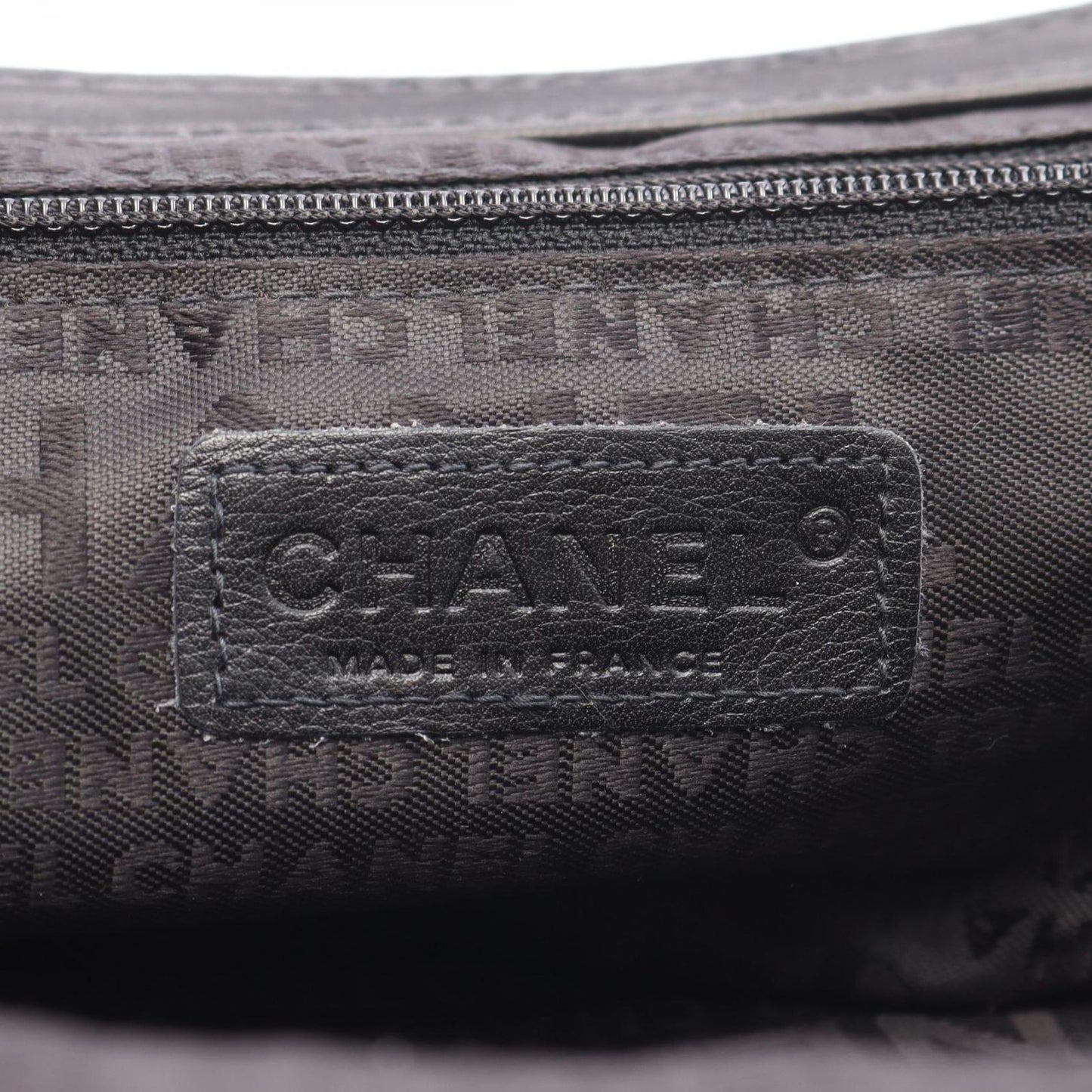 CHANEL Camellia Handbag in Black Lambskin - Timeless Elegance