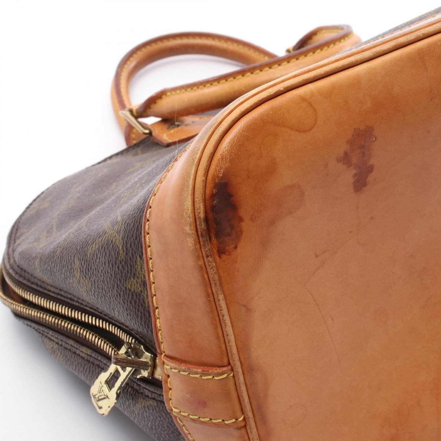 Louis Vuitton Alma PM Monogram Handbag - Timeless Elegance