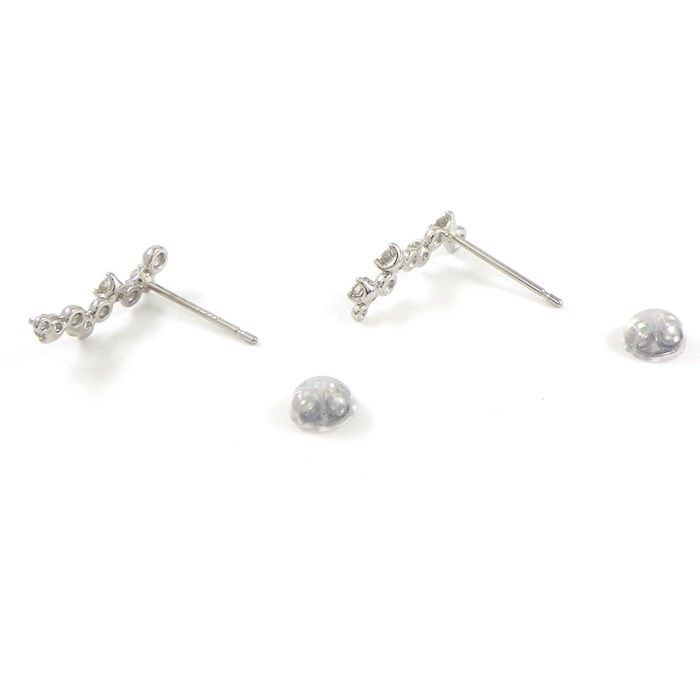 Elegant Wave Drop Diamond Earrings in Platinum - 0.11ct