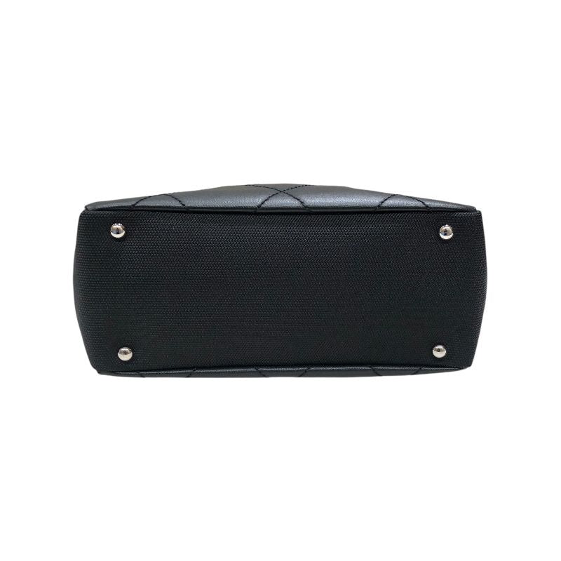 CHANEL Paris Biarritz PM Tote in Black Coated Canvas - Timeless Elegance