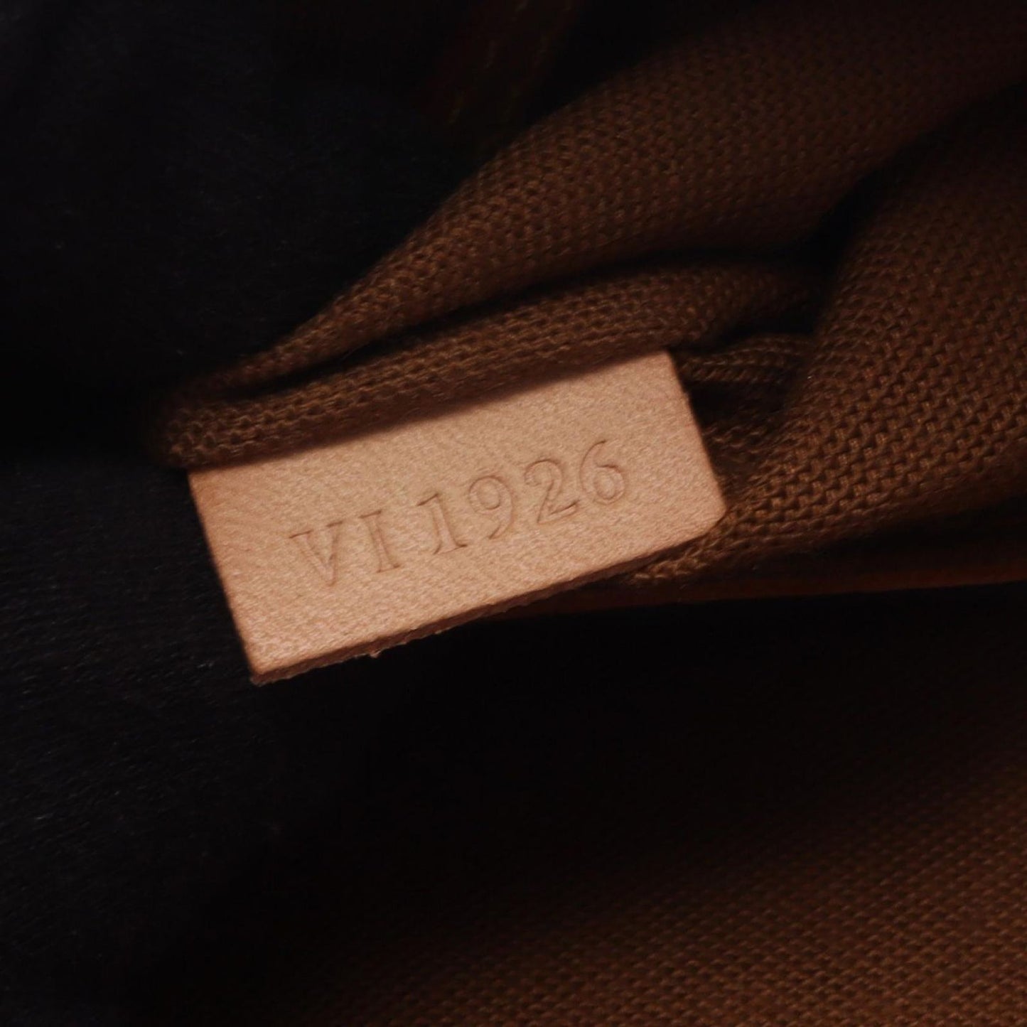 Louis Vuitton Alma PM Handbag - Timeless Elegance in Brown