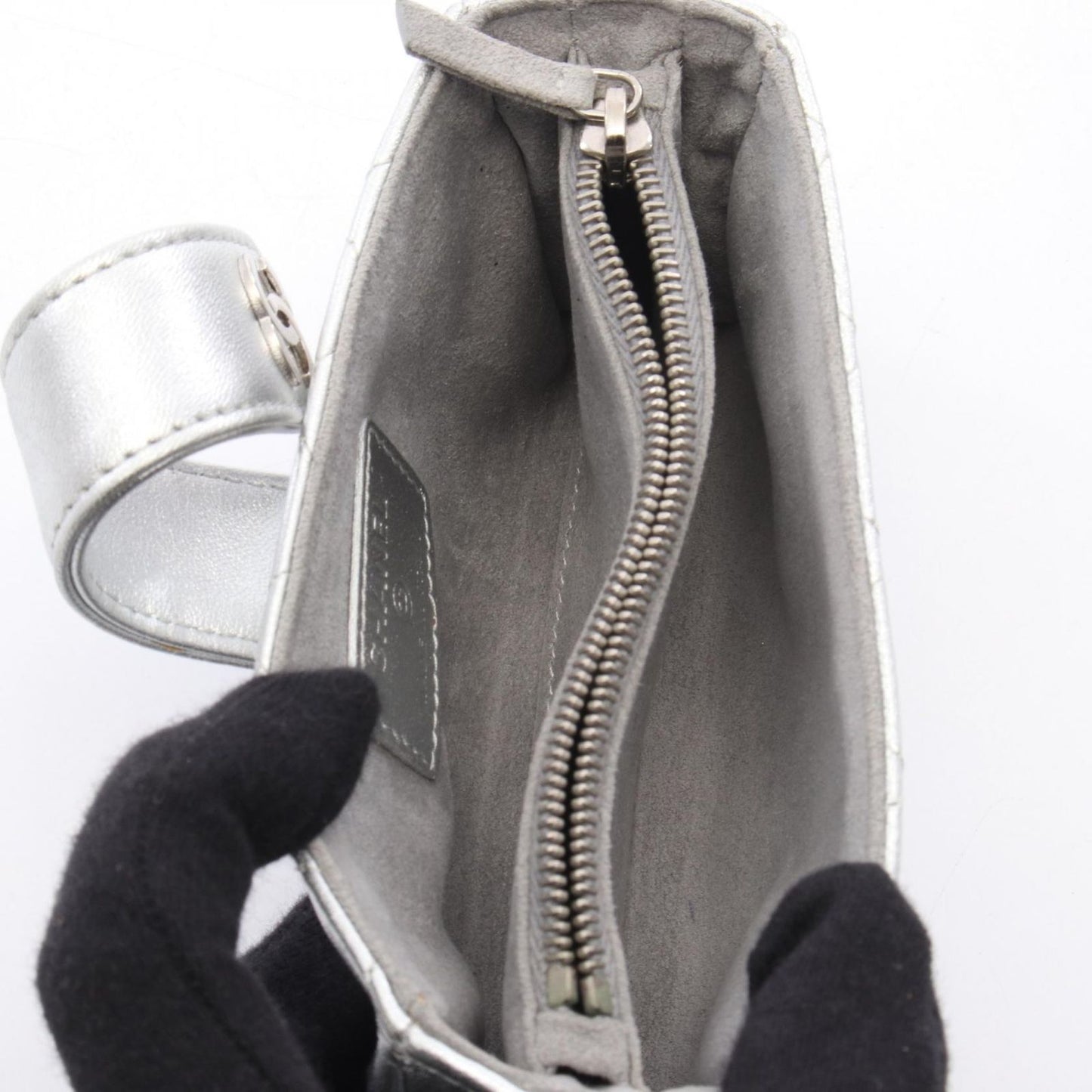 CHANEL Matelassé Silver Leather Pouch - Exquisite Craftsmanship