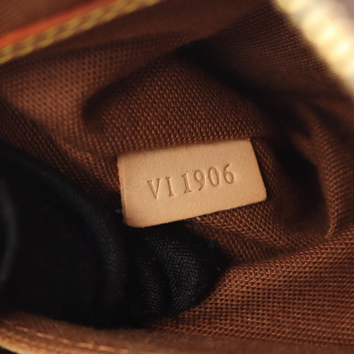 Louis Vuitton Alma PM Handbag - Timeless Elegance in Brown