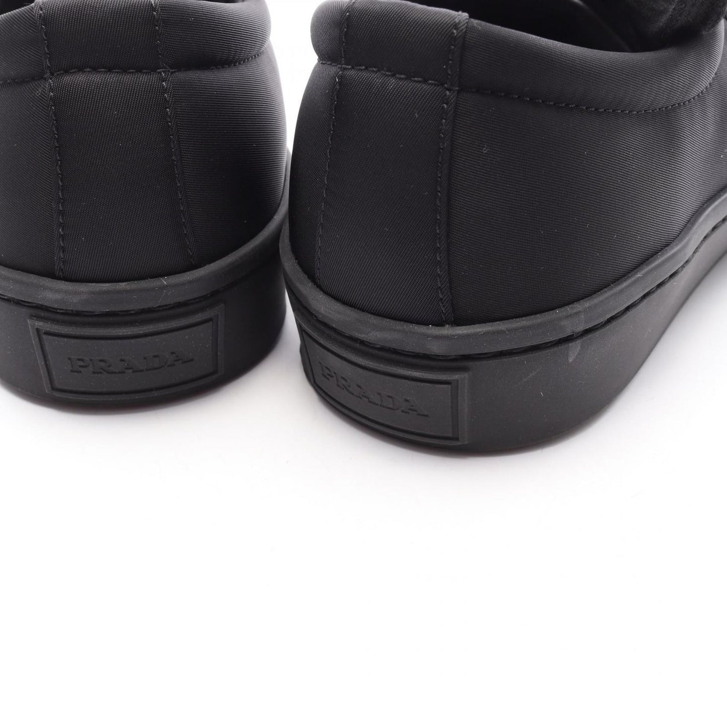 PRADA RE-NYLON Wheel Cassette Sneakers - Timeless Black Elegance