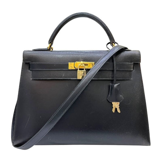 HERMES Kelly 32 Black Box Calf Handbag with Gold Hardware