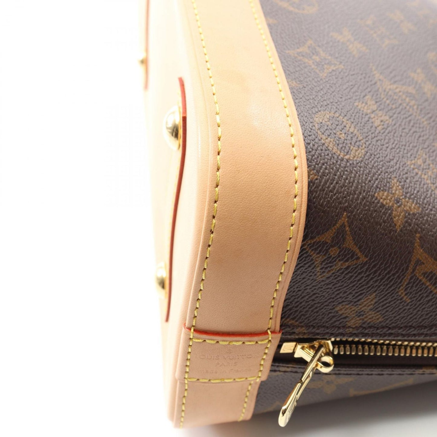 Louis Vuitton Alma Monogram Handbag - Timeless Elegance