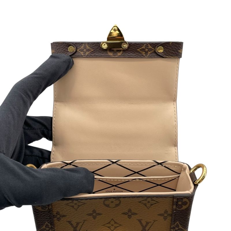 Louis Vuitton Monogram Reverse Vertical Pochette M67873 - Unisex