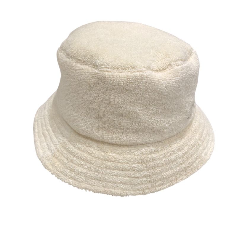 CHANEL Logo Embroidered Pile Bucket Hat in Cream Cotton