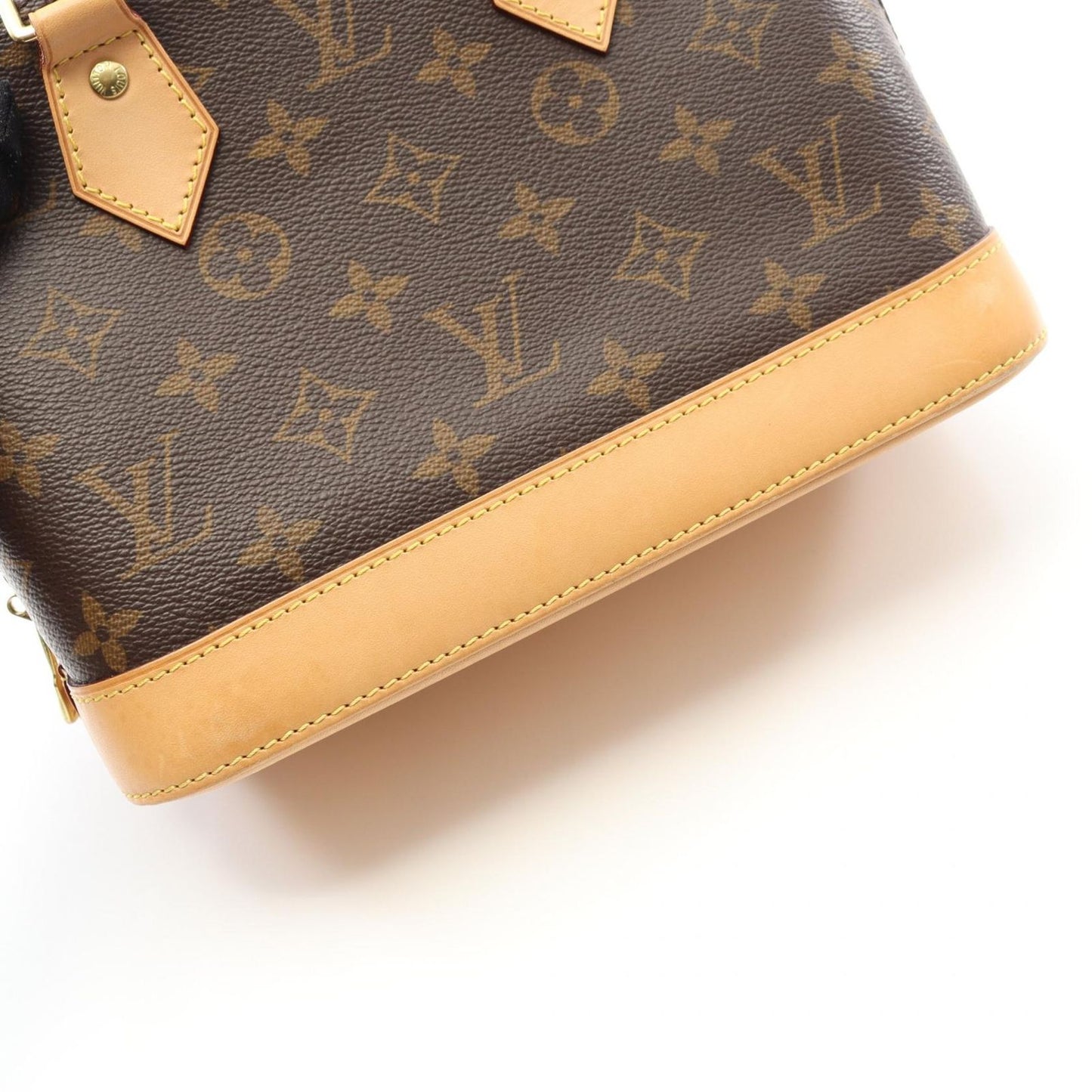 Louis Vuitton Alma BB Monogram Handbag - Timeless Elegance