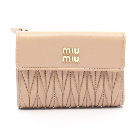 Miu Miu Matelassé Leather Tri-Fold Wallet in Savia - New