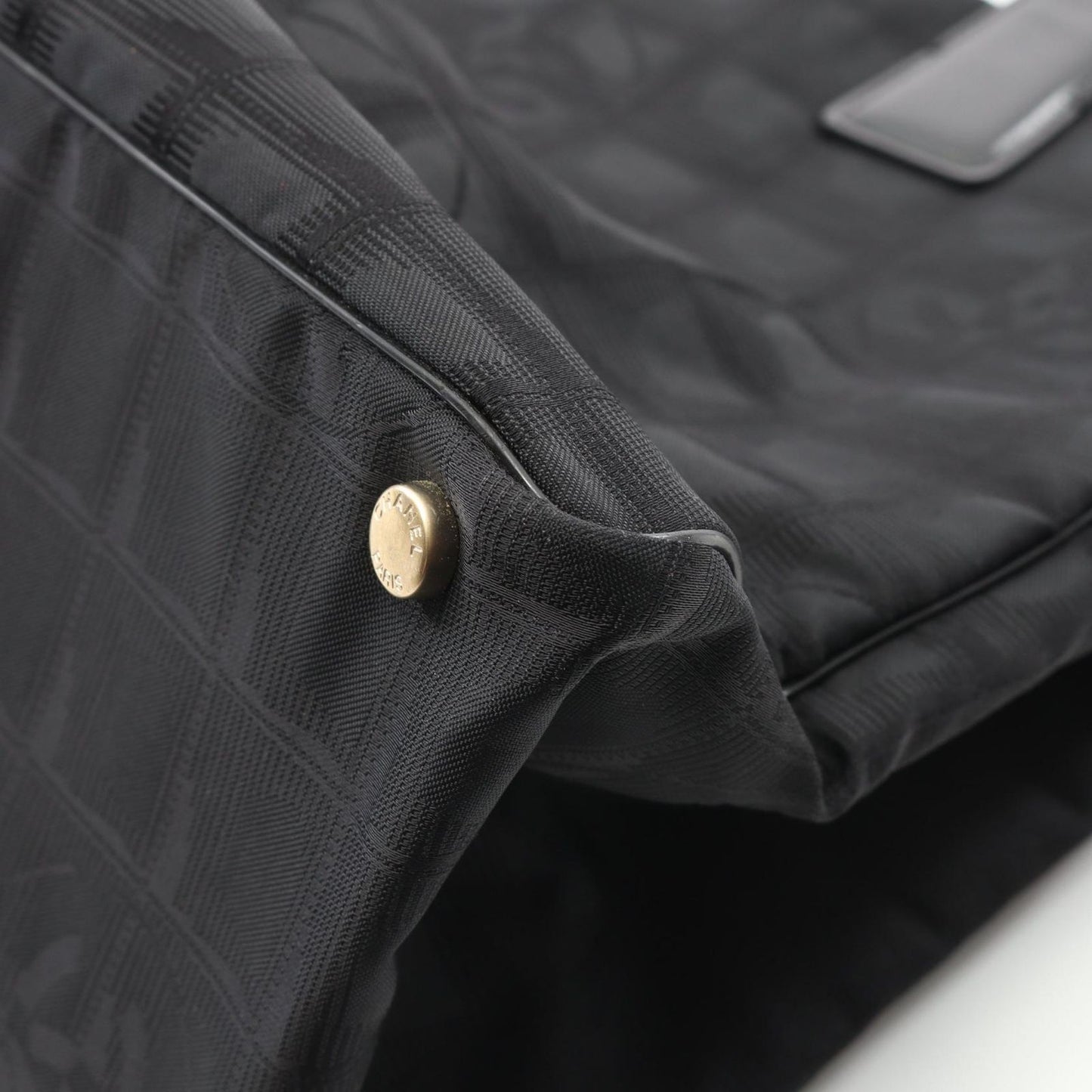 CHANEL Black Leather New Travel Line MM Tote Bag - Timeless Elegance