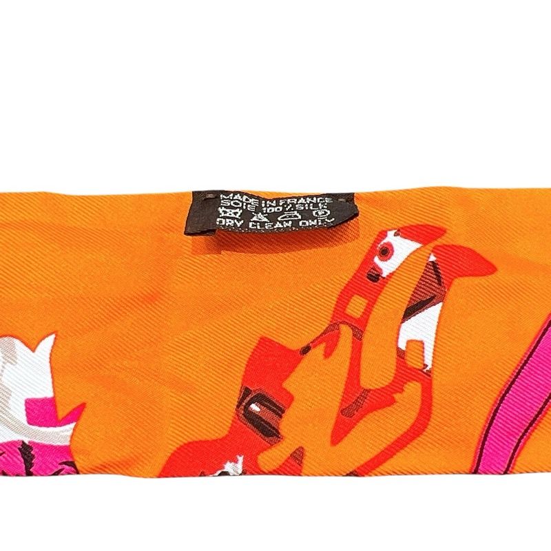 HERMES Tout en carre Twilly Scarf in Orange Silk - Exquisite Luxury