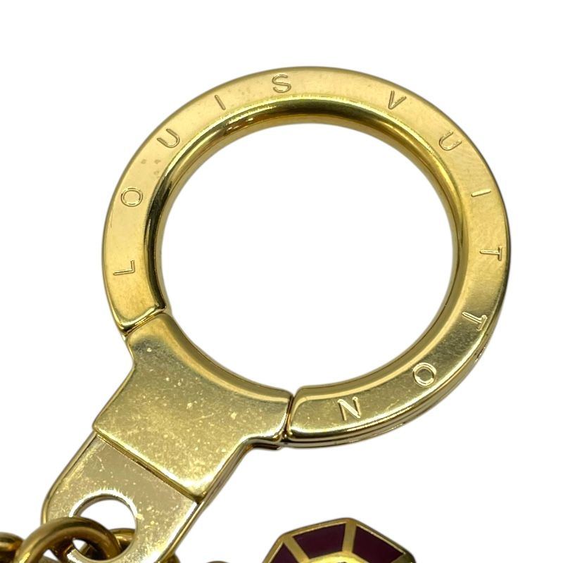 Louis Vuitton Port Clé Cabochon Gold Accessory - Timeless Elegance