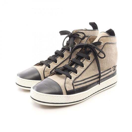 CHANEL Coco Mark High-Top Sneakers in Beige/Black Canvas & Leather