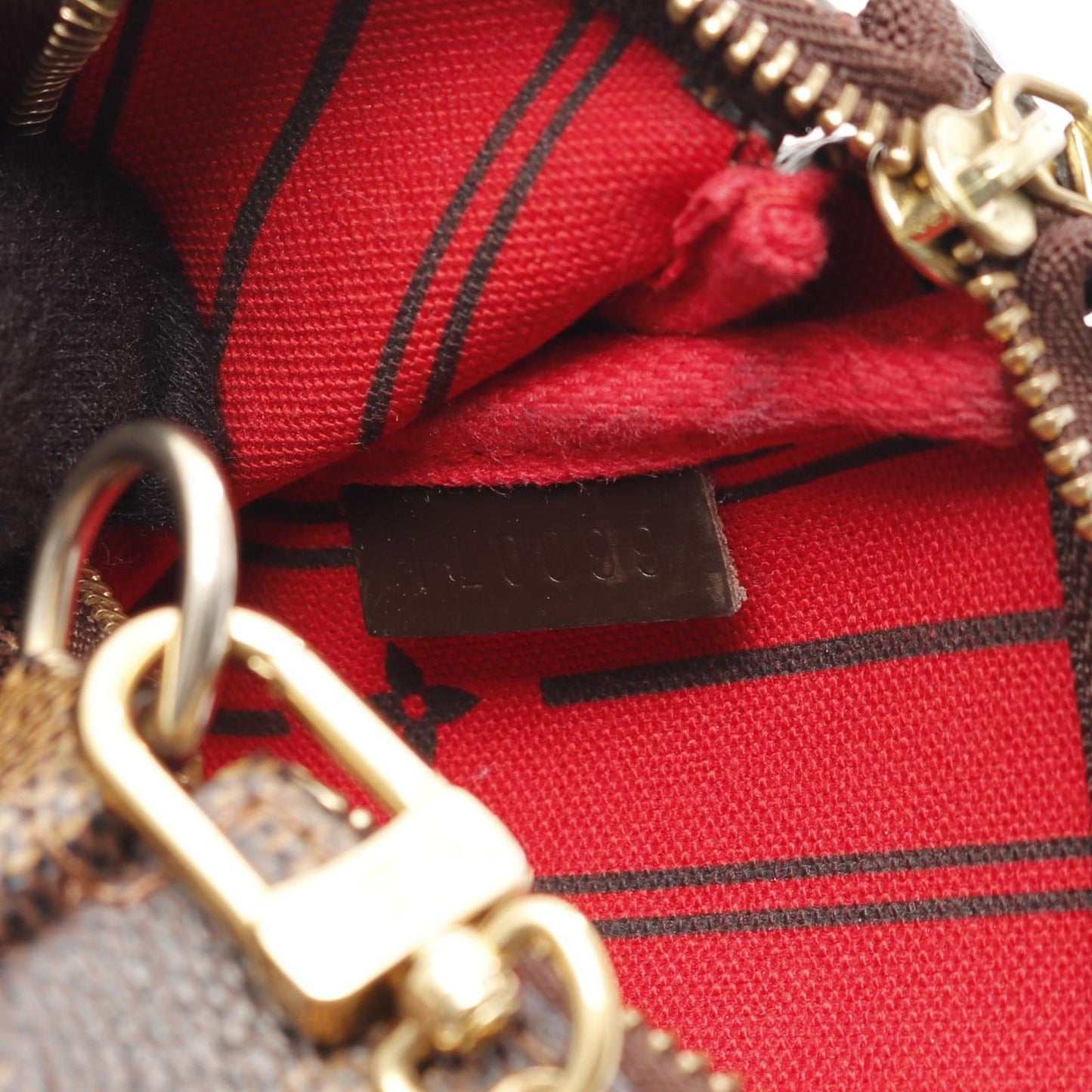 Louis Vuitton Mini Pochette Accessoires Damier Ebene Handbag