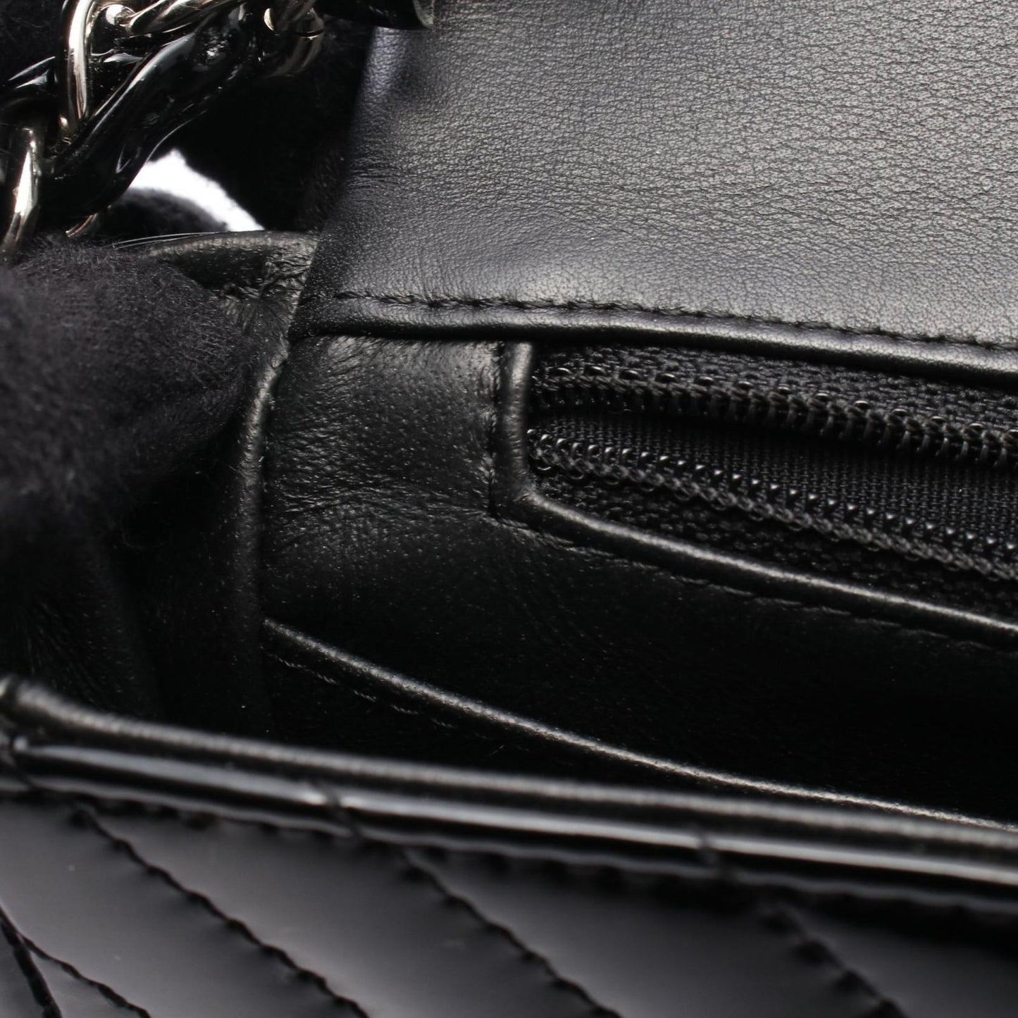 CHANEL Chevron V-Stitch Shoulder Bag in Black Patent Leather