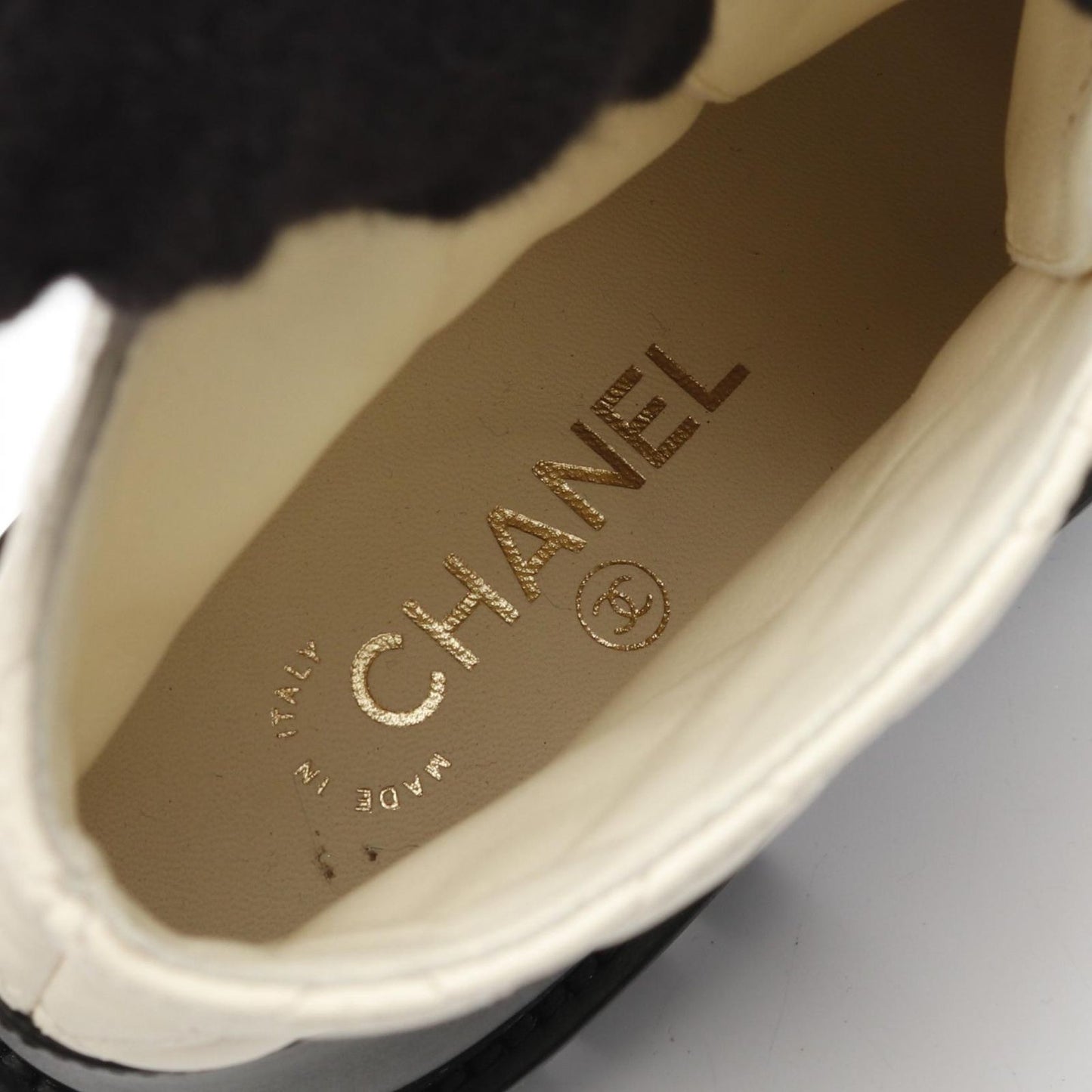 CHANEL Matelassé Leather Short Boots in White & Black - Size 36.5C