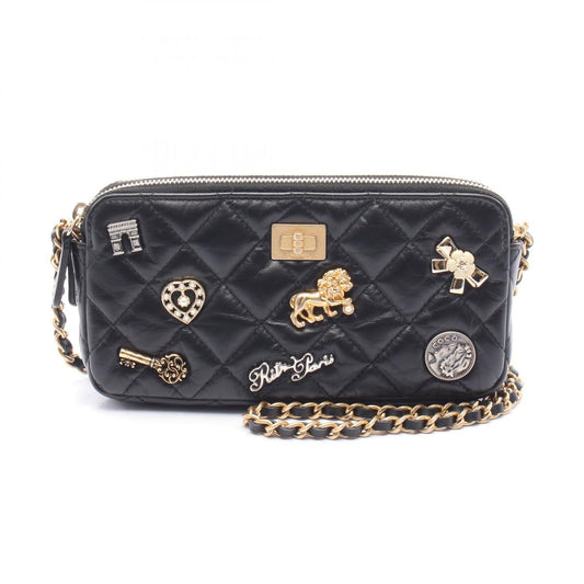 CHANEL 2.55 Matelassé Shoulder Bag - Timeless Black Leather