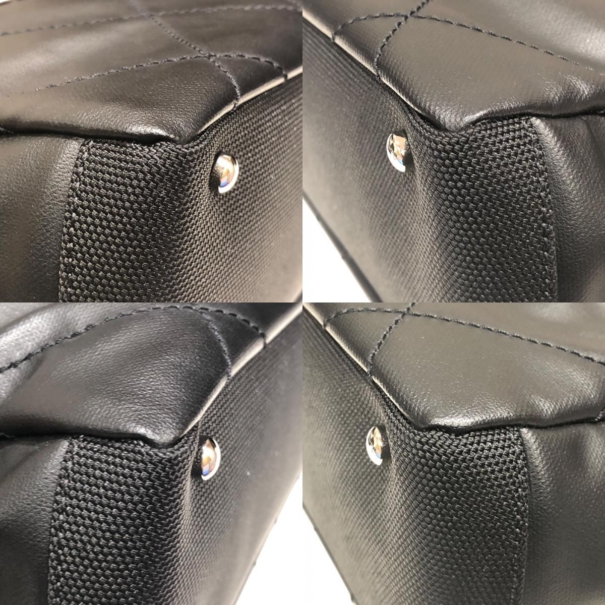 CHANEL Paris Biarritz PM Tote in Black Coated Canvas - Timeless Elegance