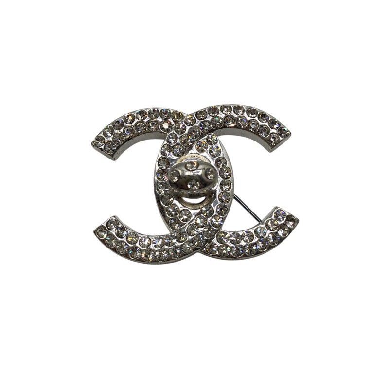 CHANEL Coco Mark Turn Lock Brooch - Exquisite Metal & Strass