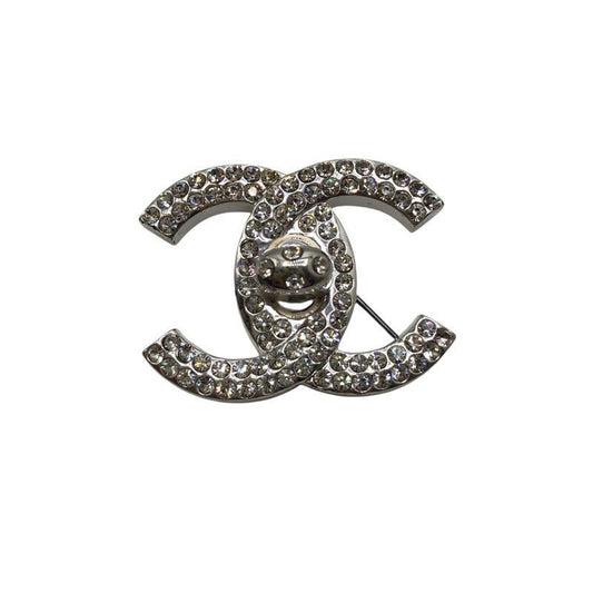CHANEL Coco Mark Turn Lock Brooch - Exquisite Metal & Strass