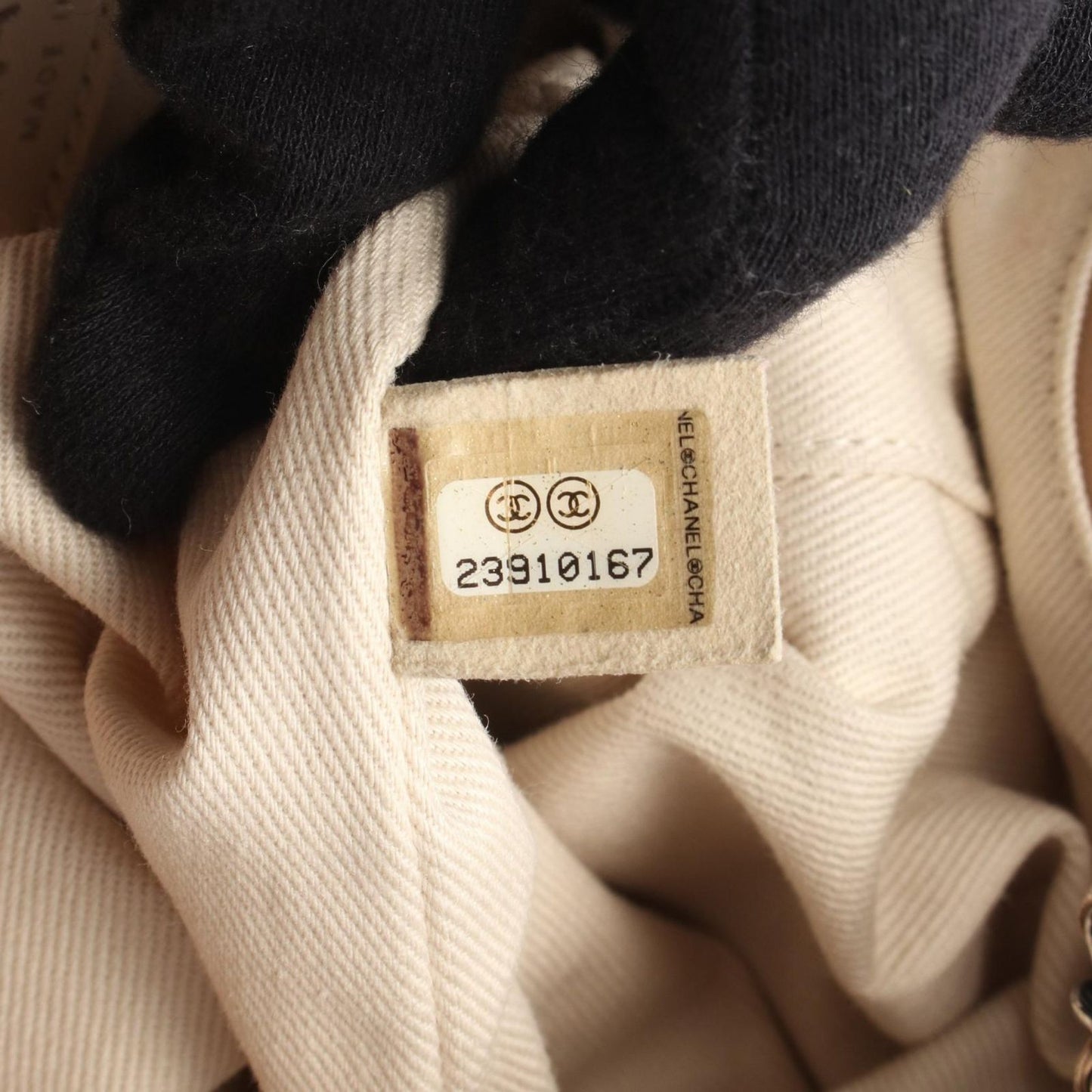 CHANEL Matelassé Coco Mark Backpack in Beige Lambskin