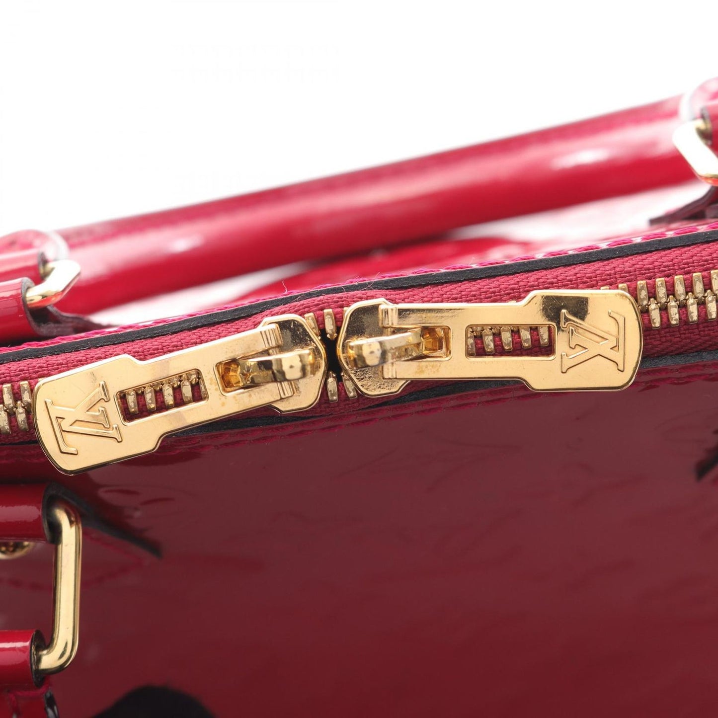 Louis Vuitton Alma PM Monogram Vernis Handbag in Magenta