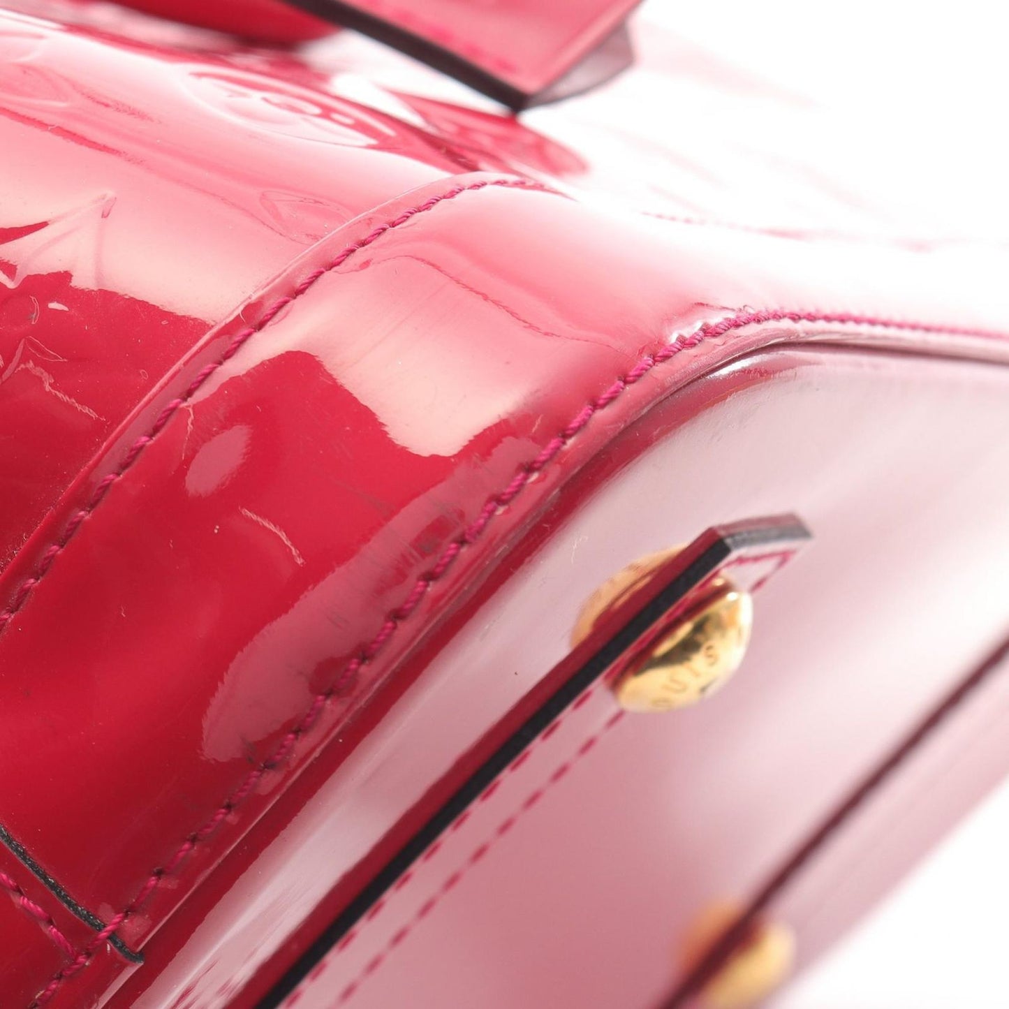 Louis Vuitton Alma PM Monogram Vernis Handbag in Magenta