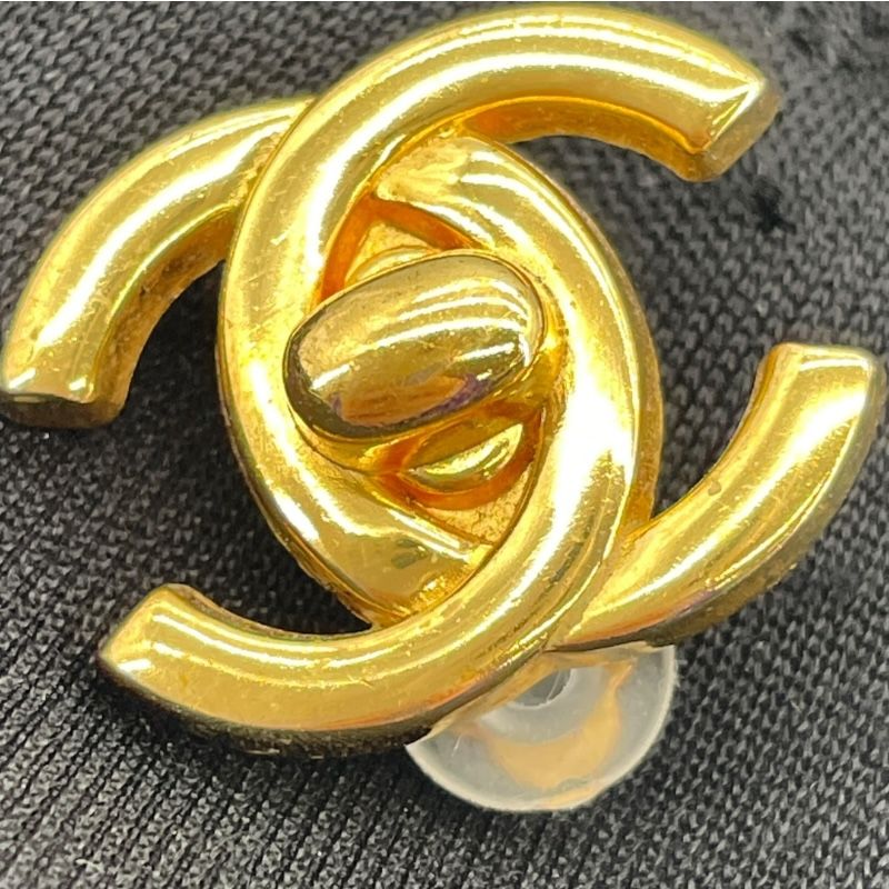 CHANEL Coco Mark Turn Lock Earrings in Gold Metal