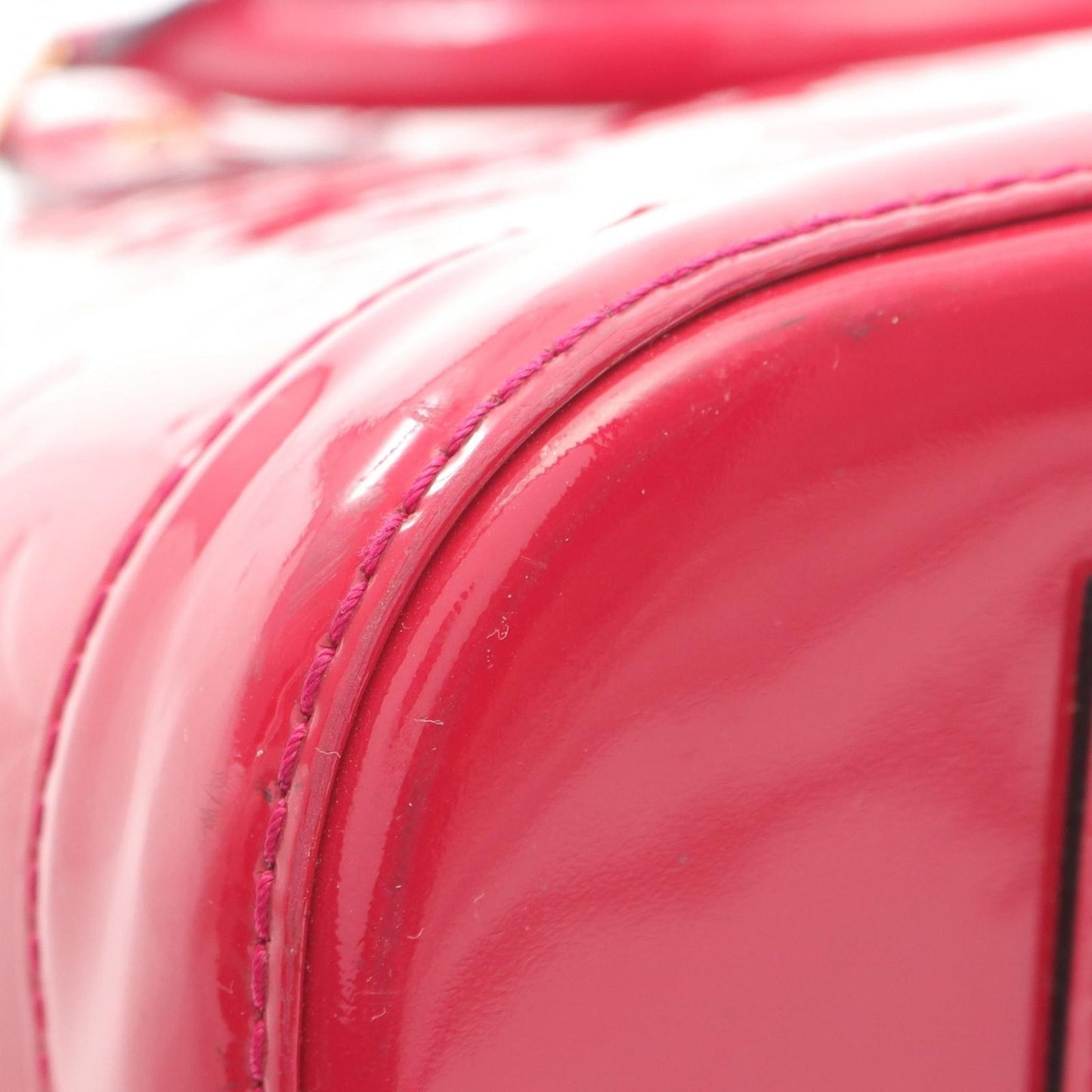 Louis Vuitton Alma PM Monogram Vernis Handbag in Magenta