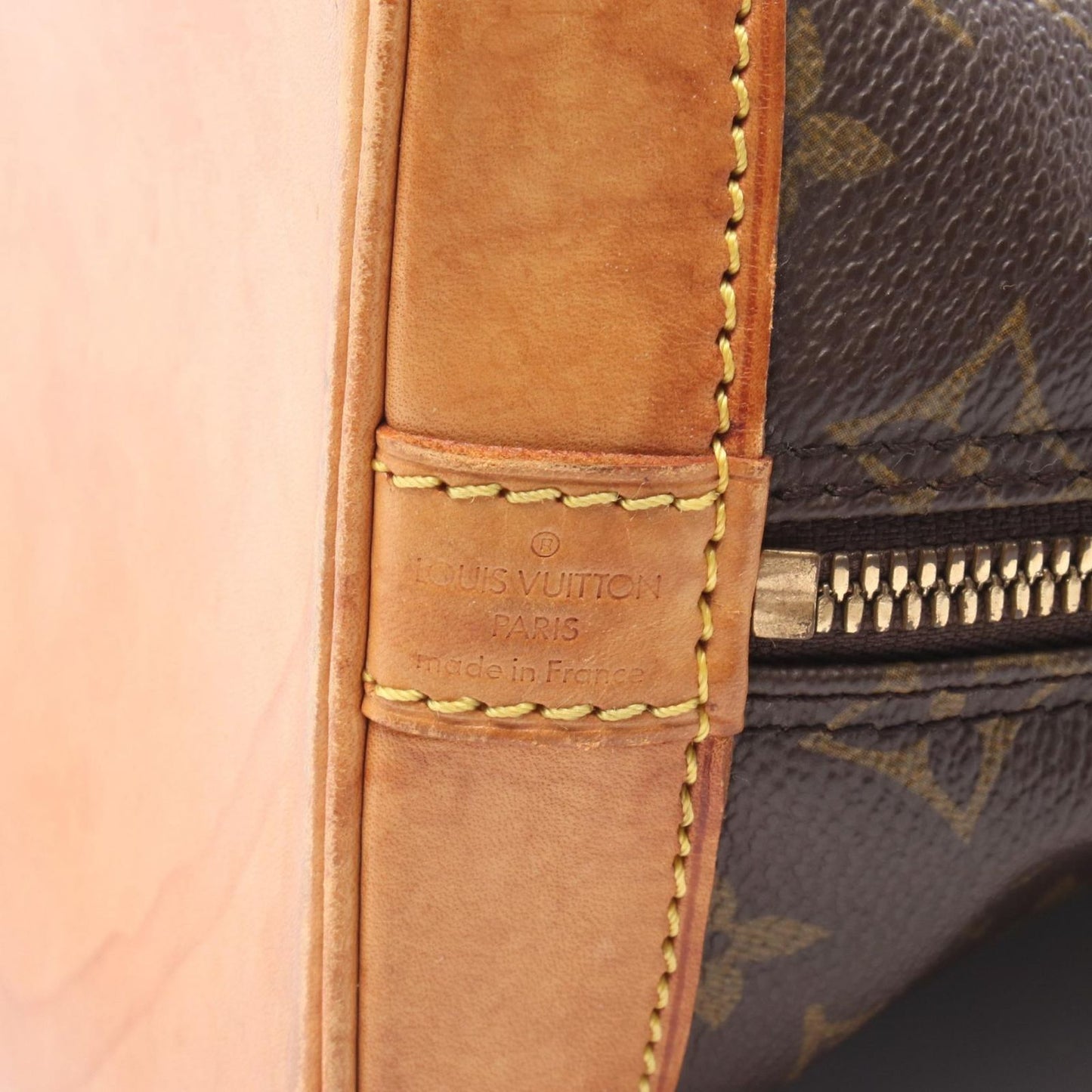 Louis Vuitton Alma PM Monogram Handbag - Timeless Elegance