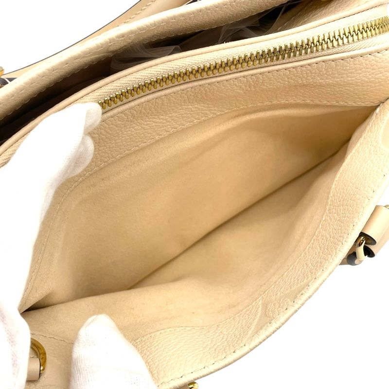 Louis Vuitton OnTheGo EW Monogram Empreinte Handbag - White