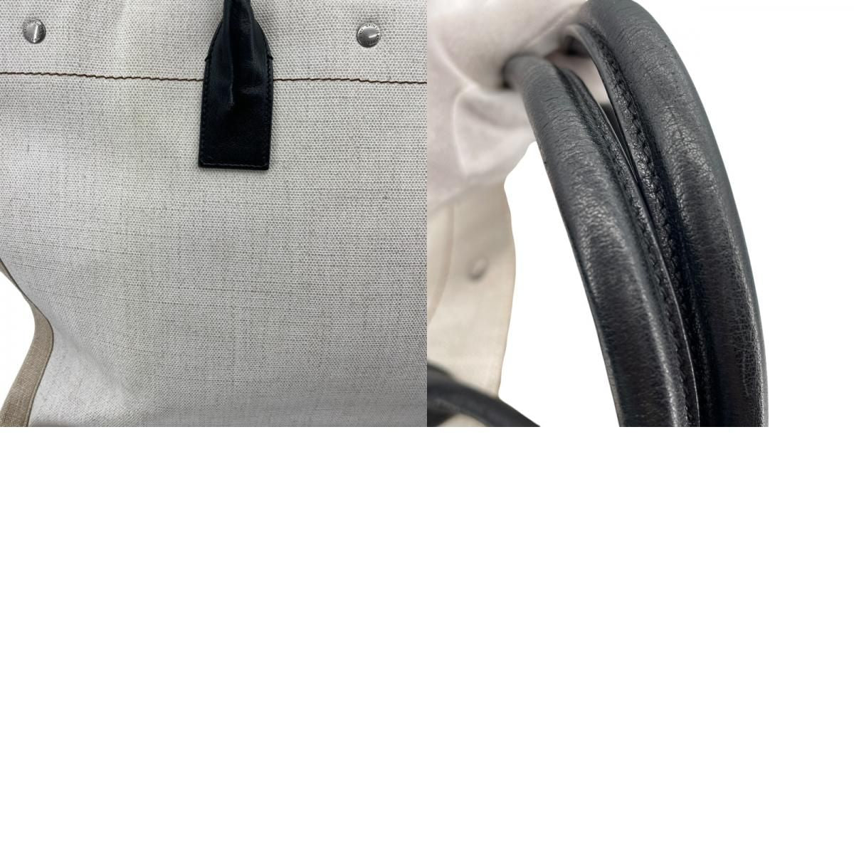 SAINT LAURENT Rive Gauche Tote in Beige Canvas & PVC - Unisex