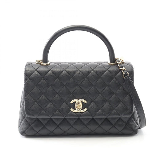 CHANEL Coco Handle 29 Flap Bag in Black Calfskin - Timeless Elegance