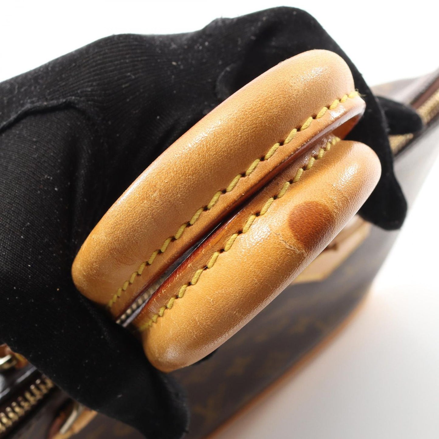 Louis Vuitton Alma PM Handbag - Timeless Elegance in Brown